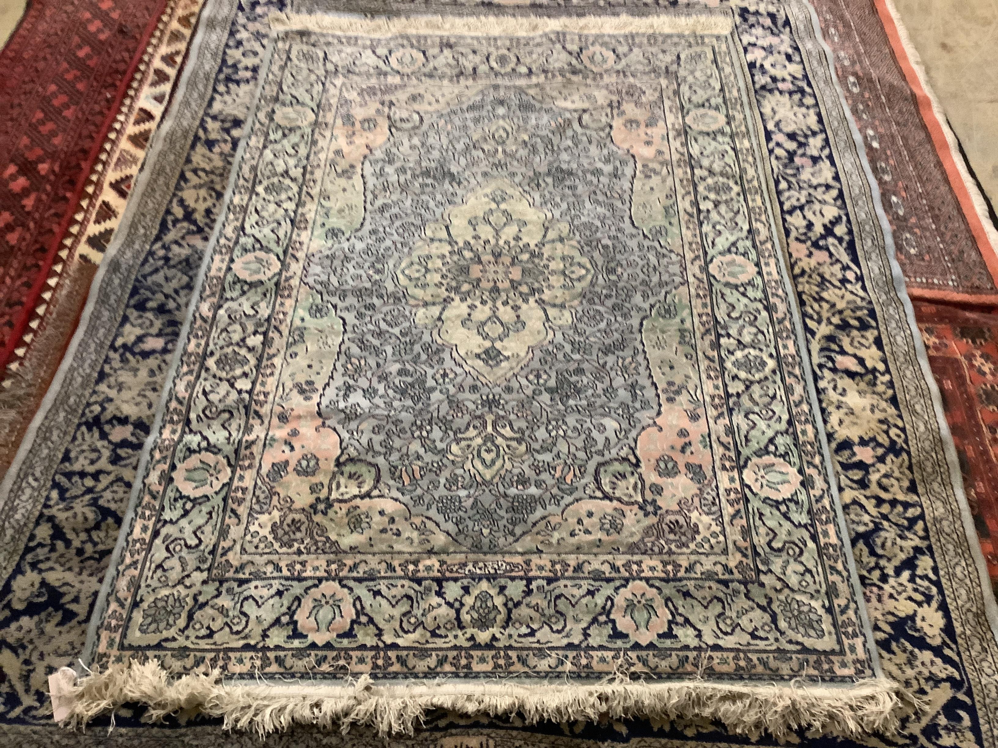 Two Persian style pale blue ground carpets, 239 x 170cm and 170 x 123cm